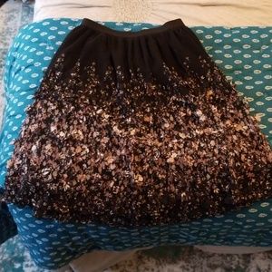 Black short swing skirt with cutout flowers